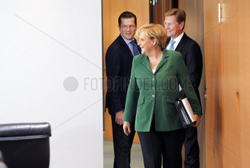 zu Guttenberg + Merkel + Westerwelle