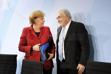Merkel + Strauss-Kahn