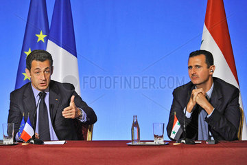 Sarkozy + Al-Assad