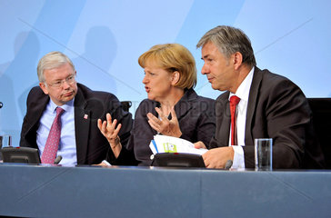 Koch + Merkel + Wowereit