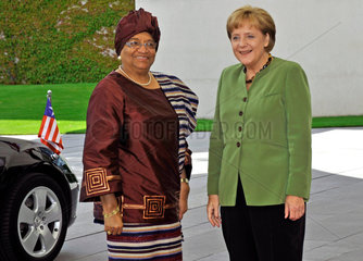Johnson-Sirleaf + Merkel