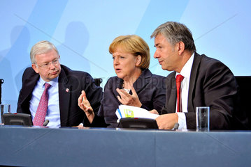 Koch + Merkel + Wowereit