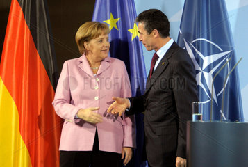 Merkel + Rasmussen