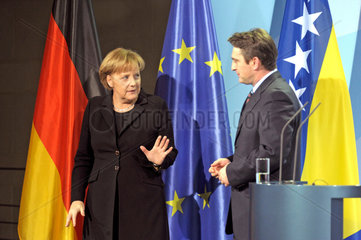 Merkel + Komsic