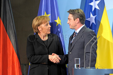 Merkel + Komsic