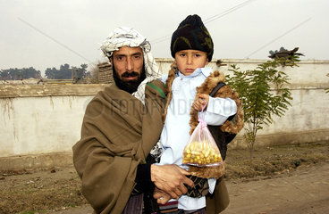 Vater mit Kind in Kunduz