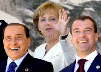 Berlusconi + Merkel + Medwedew