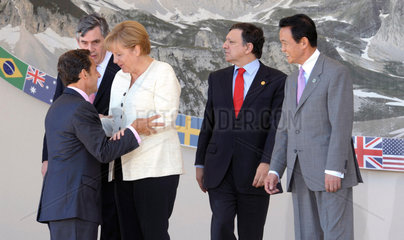 Sarkozy + Brown + Merkel + Barroso + Aso