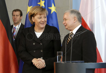 Merkel + Kaczynski