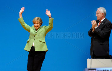 Merkel + Ruettgers