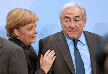 Merkel + Strauss-Kahn