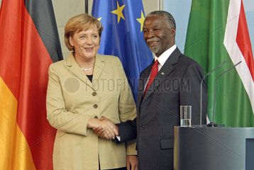 Merkel + Mbekik