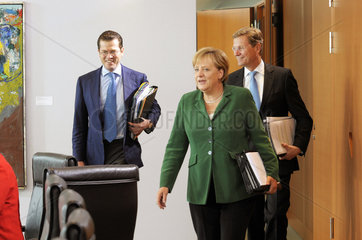 zu Guttenberg + Merkel + Westerwelle