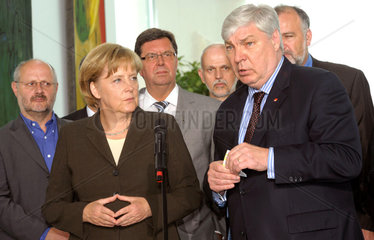 Merkel + Gewerkschafter