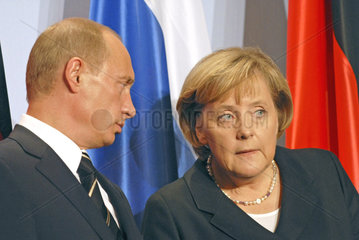 Putin + Merkel