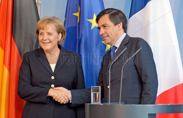 Merkel + Fillon