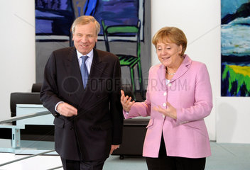 de Hoop Scheffer + Merkel