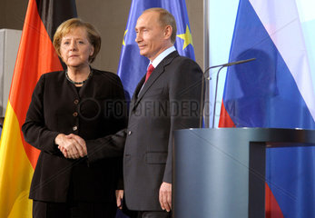 Merkel + Putin