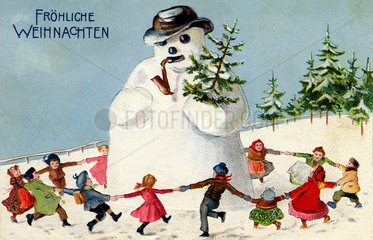 Kinder tanzen um einen Schneemann  1907