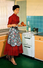 Hausfrau in der Kueche  1953