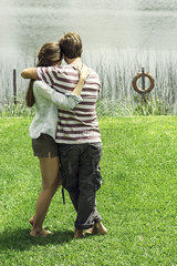 Young couple enjoying weekend holiday at lake