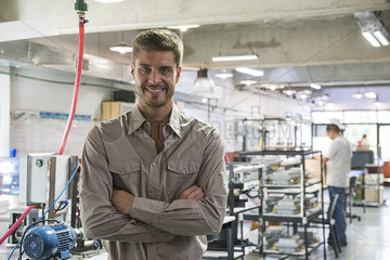 Man smiling in workshop  portrait
