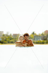Couple relaxing together in lake