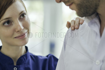 Healthcare worker reassuring patient