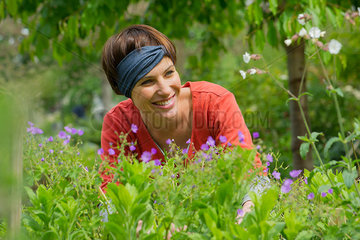 Woman smiling in garden