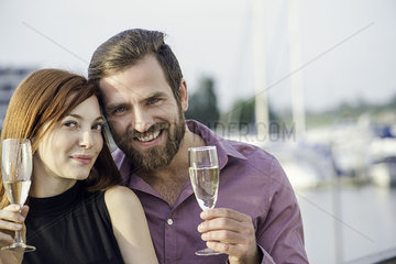 Couple drinking champagne together