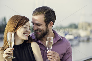 Couple drinking champagne together
