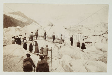 Walkers in the mountains  c 1900.
