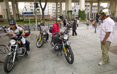 Motorradfahrer in Shanghai