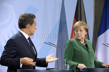 Sarkozy + Merkel