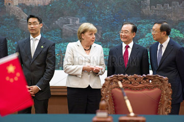 Roesler + Merkel + Wen Jiabao + Yan Jiechi