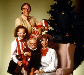Familie unterm Weihnachtsbaum