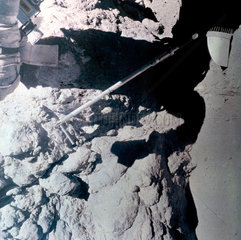 Apollo 17 sample scoop  photographed against lunar rock  1972.