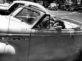 Woman sleeping in a car  Rock Creek park  Washington DC  USA  1942.