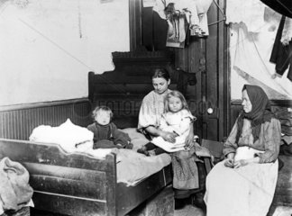 Immigrant women and children at home  New York  c 1908-1918.