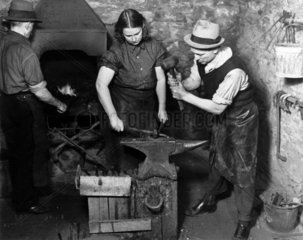 Blacksmiths at work  New York City  c 1910s.
