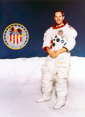 Astronaut Charles Duke with Apollo 16 mission badge  1971.