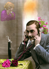 Paar telefoniert 1910
