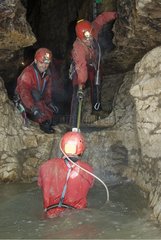 Difficult passage in speleology in the river Meuse