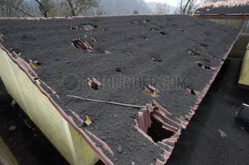 Devastated roof by eruption of Pacaya volcano in Guatemala