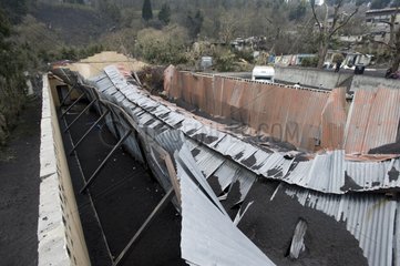 Devastated roof by eruption of Pacaya volcano in Guatemala