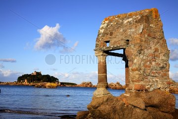 Ruin on the pink granit coast Brittany France