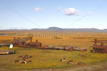 Old trains in tundra between Nome and Council Alaska