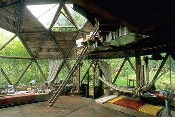 Brazilian hammock in a green house Ariège