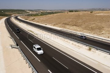 Cars on a motorway of the center of Spain