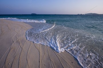 Waves on the sand beach Ko Tarutao Maritim NP Thailand